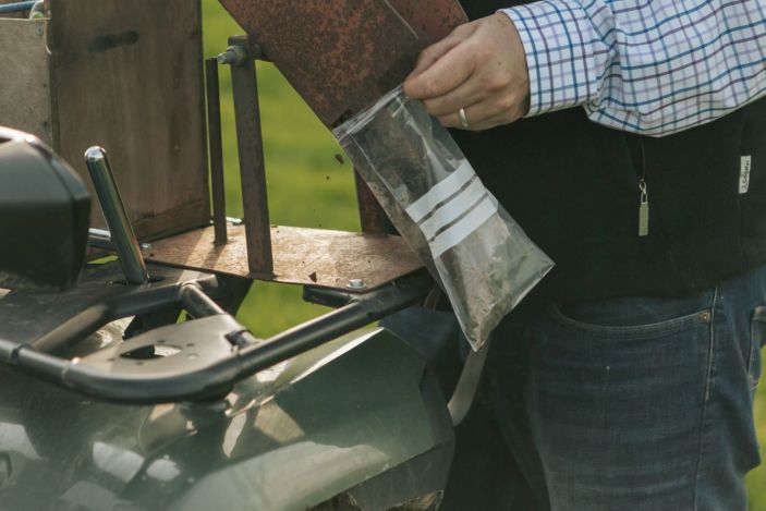 Bagging up soil samples from the drilled cores