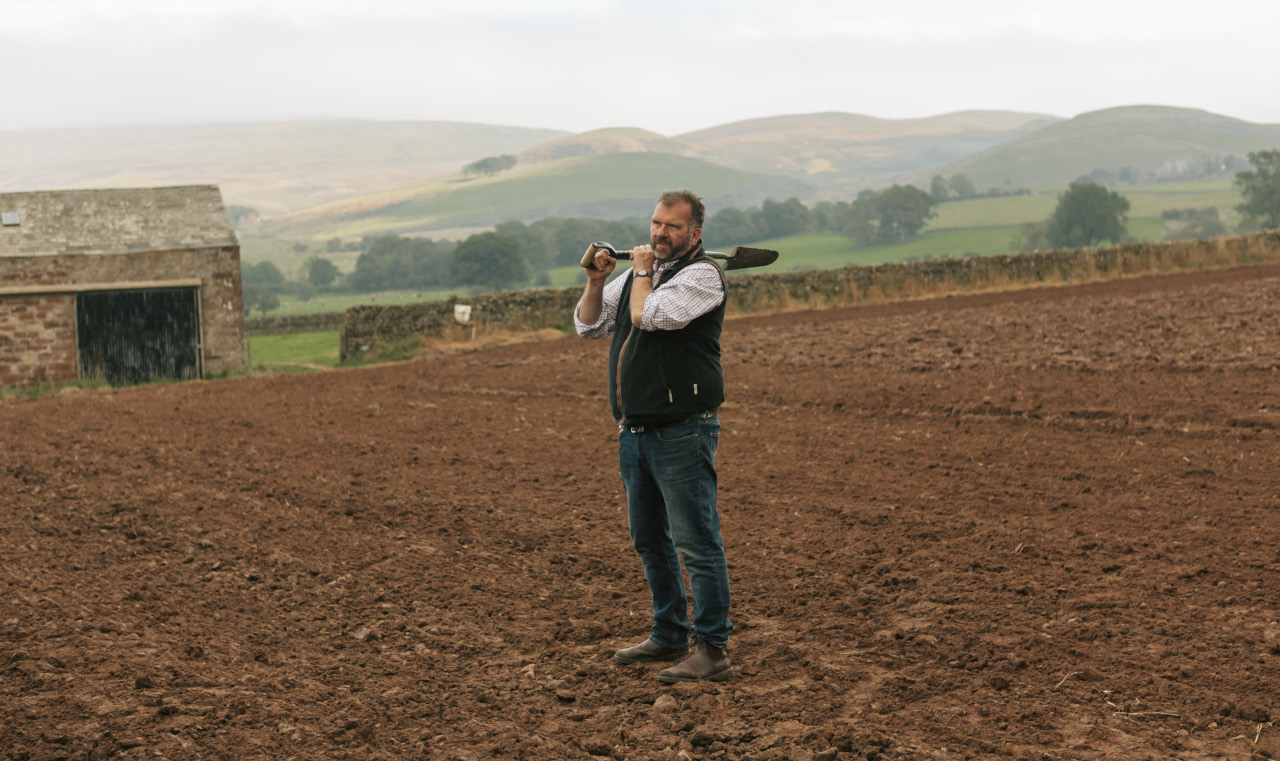 Ben Goad, with spade, proprietor of Eco prospects at work checking soil health in Eden Valley.